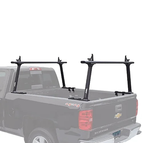 Side view of black Thule TracRac TracOne rack mounted on black pickup truck