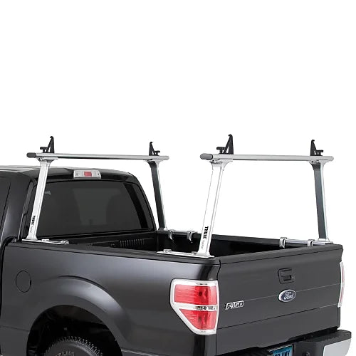 Thule TracRac TracOne silver rack on grey Ford pickup — rear angle