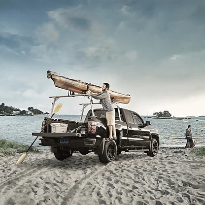 Thule TracRac Pro 2 carrying kayak on pickup truck at beach loading area