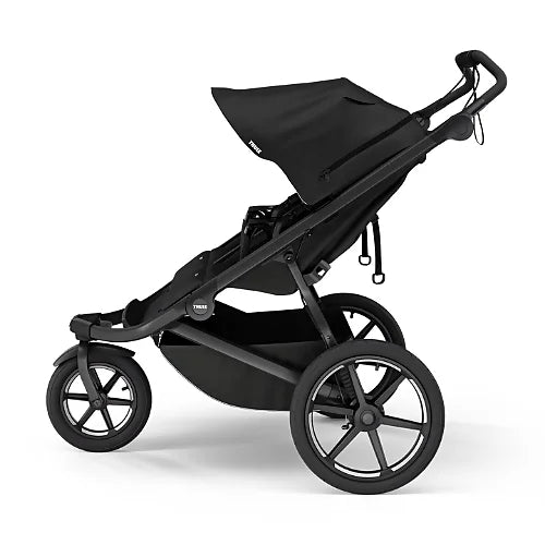 Side profile of the Thule Urban Glide 3 double black all-terrain stroller with large wheels and canopy extended