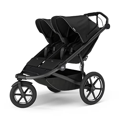 Thule Urban Glide 3 double side-by-side stroller in black featuring dual adjustable seats and air-filled tires