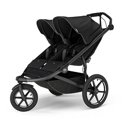 Thule Urban Glide 3 double side-by-side stroller in black featuring dual adjustable seats and air-filled tires