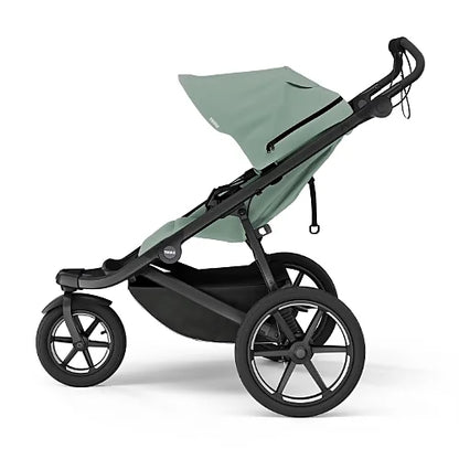 Thule Urban Glide 3 green all-terrain stroller with full canopy extension and large wheels