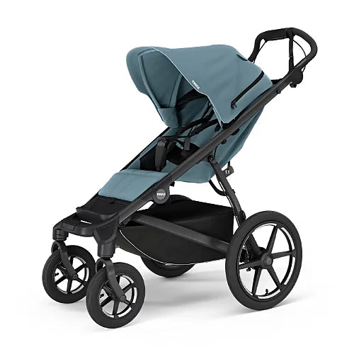 Thule Urban Glide 4-Wheel stroller in mid blue with large canopy and ergonomic handlebar