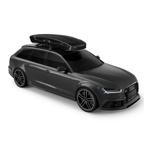Thule Vector Alpine roof cargo box mounted on car side angle showing seamless integration and luxury design