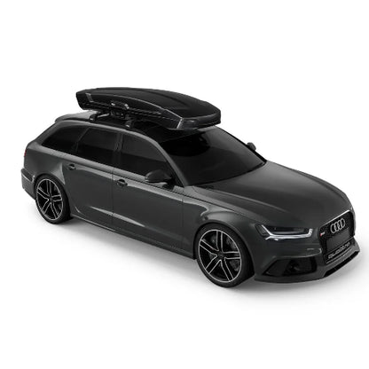 Thule Vector Alpine roof cargo box mounted on car side angle showing seamless integration and luxury design