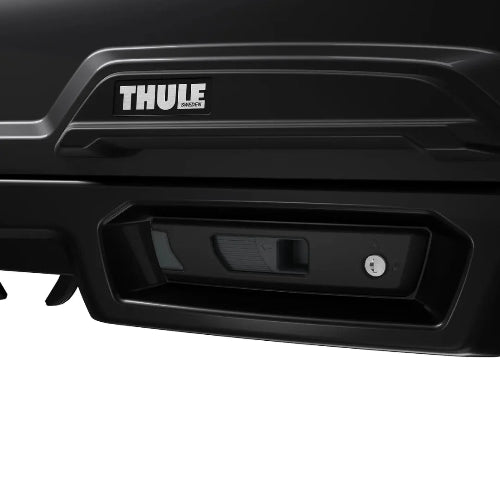 Thule Vector Alpine SlideLock close-up showing premium locking mechanism and ergonomic handle