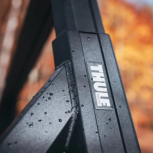 Close-up view of Thule Xscape upright showing rugged aluminum construction and Thule logo