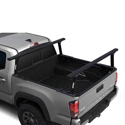 Thule Xsporter Pro Mid black truck bed rack mounted on compact pickup for rooftop tents or gear