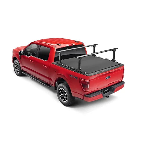 Rear quarter view of Truxedo Elevate Rack with tonneau cover installed on red truck