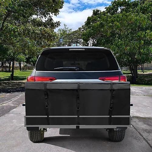 Heavy-duty green hitch cargo carrier bag on Jeep for off-road travel