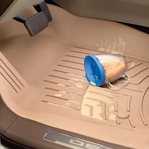 Beige WeatherTech FloorLiner with spilled drink containment