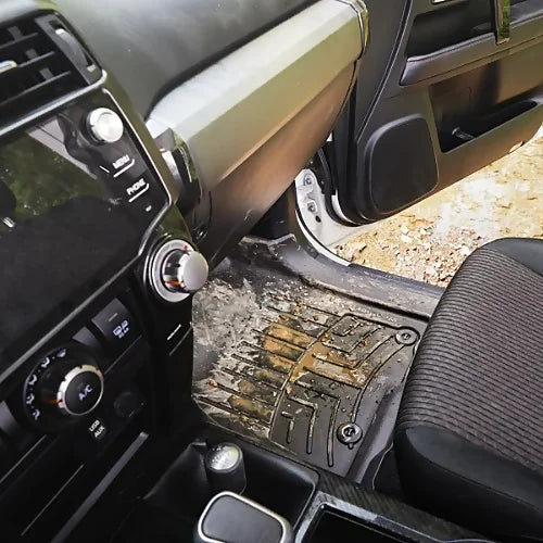 WeatherTech FloorLiner installed on driver’s side protecting carpet from mud and debris