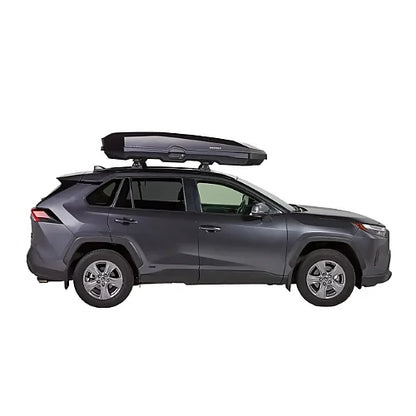 Yakima CBX LG rooftop cargo box mounted on SUV, side profile view