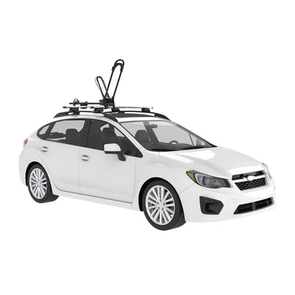 Yakima FrontLoader Yakima FrontLoader bike rack installed on crossbars on a white hatchback vehicle.on white car