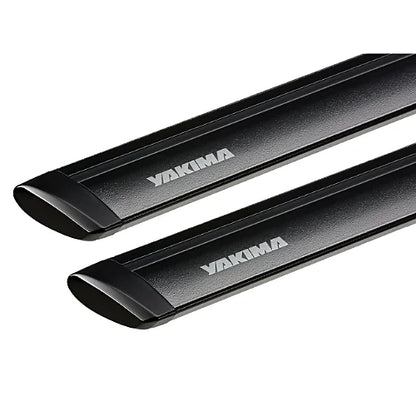 Close-up view of Yakima JetStream black crossbars showing aerodynamic teardrop profile and textured alloy finish