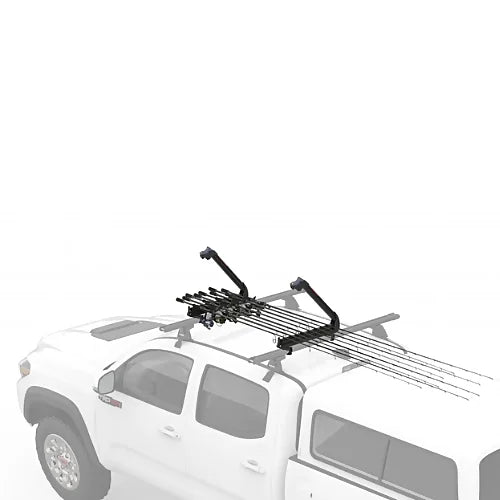 Yakima ReelDeal rooftop fishing rod rack mounted on pickup truck crossbars carrying rods
