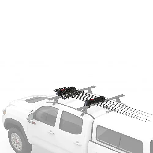 Yakima ReelDeal fishing rod carrier mounted flat on pickup roof rack holding multiple rods