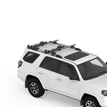 Yakima ShowDown folded flat on SUV roof rack for reduced wind drag when not in use.