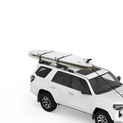 Yakima ShowDown Load-Assist SUP Mount transporting stand-up paddleboards on SUV roof rack