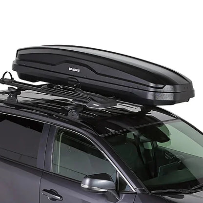 Yakima SkyBox NX Skinny cargo box mounted securely to SUV roof crossbars
