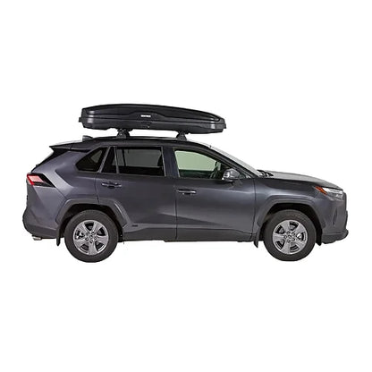 Yakima SkyBox NX Skinny roof box mounted on SUV shown from side profile