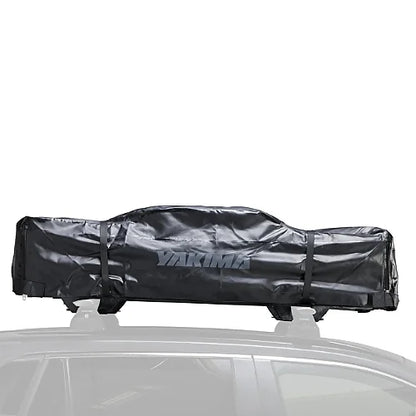 Folded Yakima SkyRise HD rooftop tent in black softshell cover on roof rack