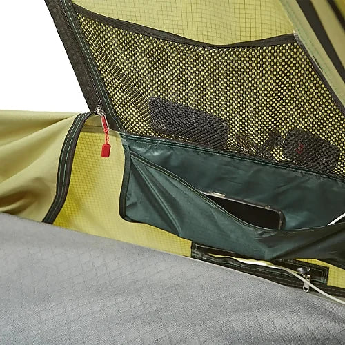 Interior view of Yakima SkyRise HD rooftop tent mesh gear storage and phone pocket