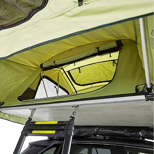 Underside view of Yakima SkyRise HD rooftop tent showing ladder entry and fabric construction