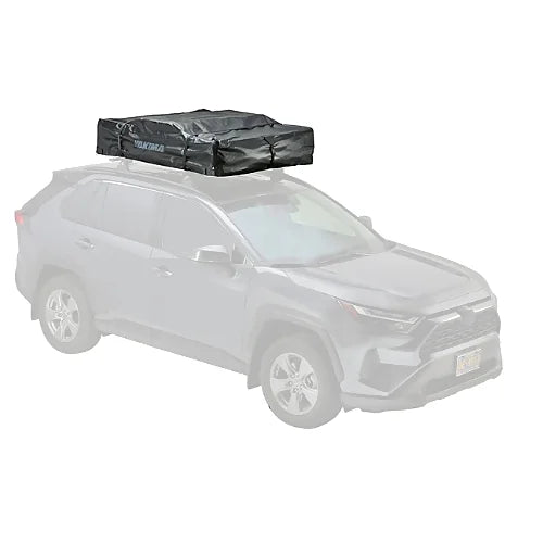 Yakima SkyRise SL rooftop tent folded with protective cover secured on SUV