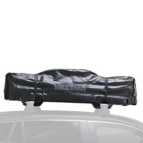 Yakima SkyRise SL rooftop tent folded inside protective softshell cover on vehicle