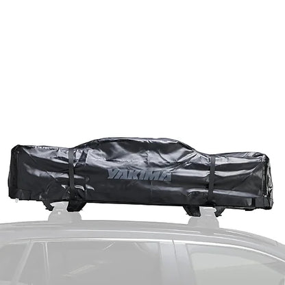 Yakima SkyRise SL rooftop tent folded inside protective softshell cover on vehicle