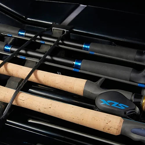Yakima TopWater interior showing fishing rods secured by foam pads and straps
